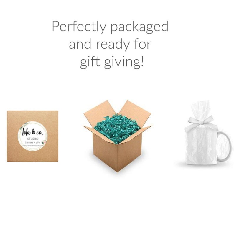 May include: A brown cardboard box with a teal shredded paper filler inside. The box is open and ready for gift giving. A white gift bag with a white ribbon is also shown.