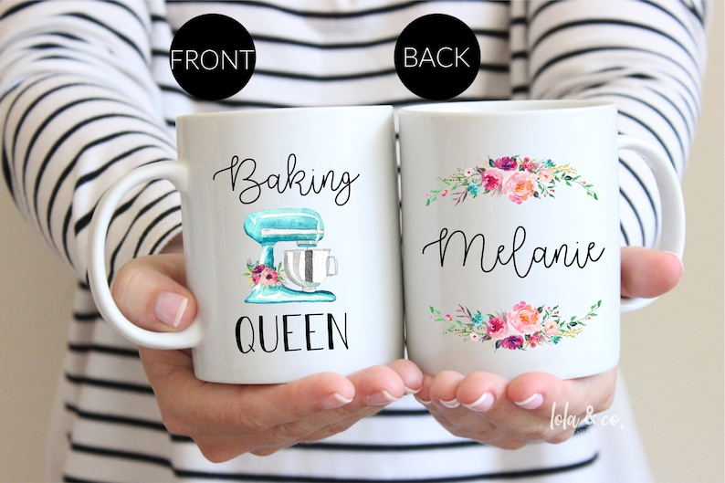 May include: White ceramic mug with a blue and white mixer illustration and the text "Baking Queen". The back of the mug has a floral design and the name "Melanie".