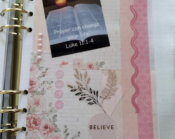 May include: A white brick wall background with a floral pattern and a pink and gold decorative border. A sticker with the text "Pray" is in the upper right corner. A sticker with the text "Prayer can change your life Luke 11:1-4" is in the upper left corner. A sticker with the text "BELIEVE" is in the lower center of the image.
