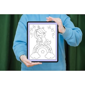 May include: A black and white printable coloring page featuring a unicorn sitting on a rainbow with clouds and a star.