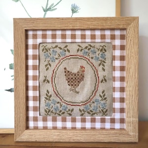 Grille de point de croix . Suzanne la poule . PDF par coconvert