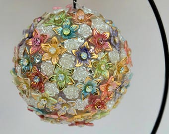 Rhinestone and beaded orb. Approximately 4" depending on size of beads. Multi color.