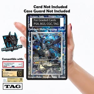 May include: A black card holder with the text "Dragon Slabs" in white, holding a Pokemon card. The card features a Zekrom character and the number 130. The holder is designed for graded cards from PSA, BGS, CGC, and TAG.