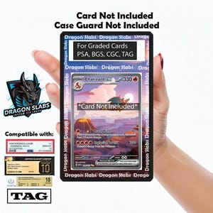 May include: A black card holder with the text "Dragon Slabs" and "For Graded Cards" is held in a hand. The holder is designed for PSA, BGS, CGC, and TAG graded cards. A Charizard EX card is visible.