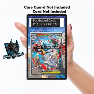 May include: A black card holder with the text "Dragon Slabs" and "For Graded Cards" is held in a hand. The holder contains a Mega Lucario EX card. The text "Card Not Included" is also visible.