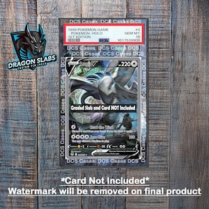 May include: A close-up of a holographic Pokemon card featuring Lugia V, a blue and white legendary Pokemon with a star on its chest. The card is in a graded slab, but the slab and card are not included. The card is from the 1999 Pokemon Game, 1st Edition. The card is graded GEM MT 10. The card is surrounded by a white border with the text "DCS Cases" repeated around the border.
