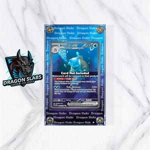 May include: A blue and white Blastoise GX trading card encased in a protective Dragon Slabs case. The card features a blue Blastoise illustration and text. The case has the words "Dragon Slabs" printed around the edges. The text "Card Not Included" is also visible.