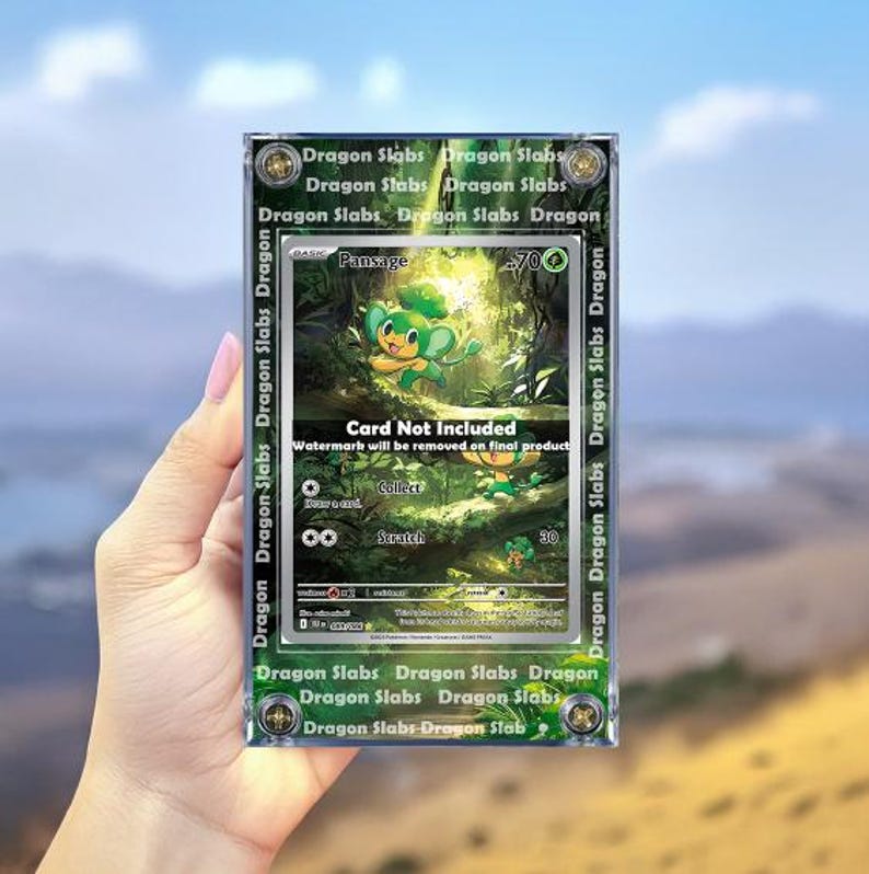 May include: A graded trading card featuring a green and yellow cartoon character, Pansage, in a forest setting. The card is encased in a clear plastic holder with the text "Dragon Slabs" and "Card Not Included".