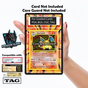 May include: A Dragon Slabs graded card case, suitable for PSA, BGS, CGC, and TAG graded cards. The image features a Charizard Pokémon card. The case text states "Card Not Included" and "Case Guard Not Included."