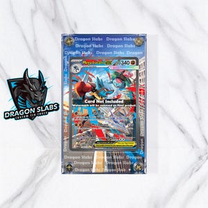 May include: A clear plastic case with a Pokemon trading card inside. The card features a Mega Lucario EX character with a 340 HP rating. The case has the text "Dragon Slabs" printed around the edges.
