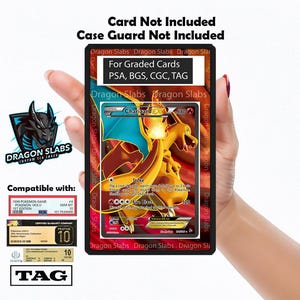 May include: Black card holder with the text "Dragon Slabs" and "For Graded Cards PSA, BGS, CGC, TAG". The holder contains a Charizard EX Pokémon card. Compatible with 1999 Pokémon Game cards and TAG.