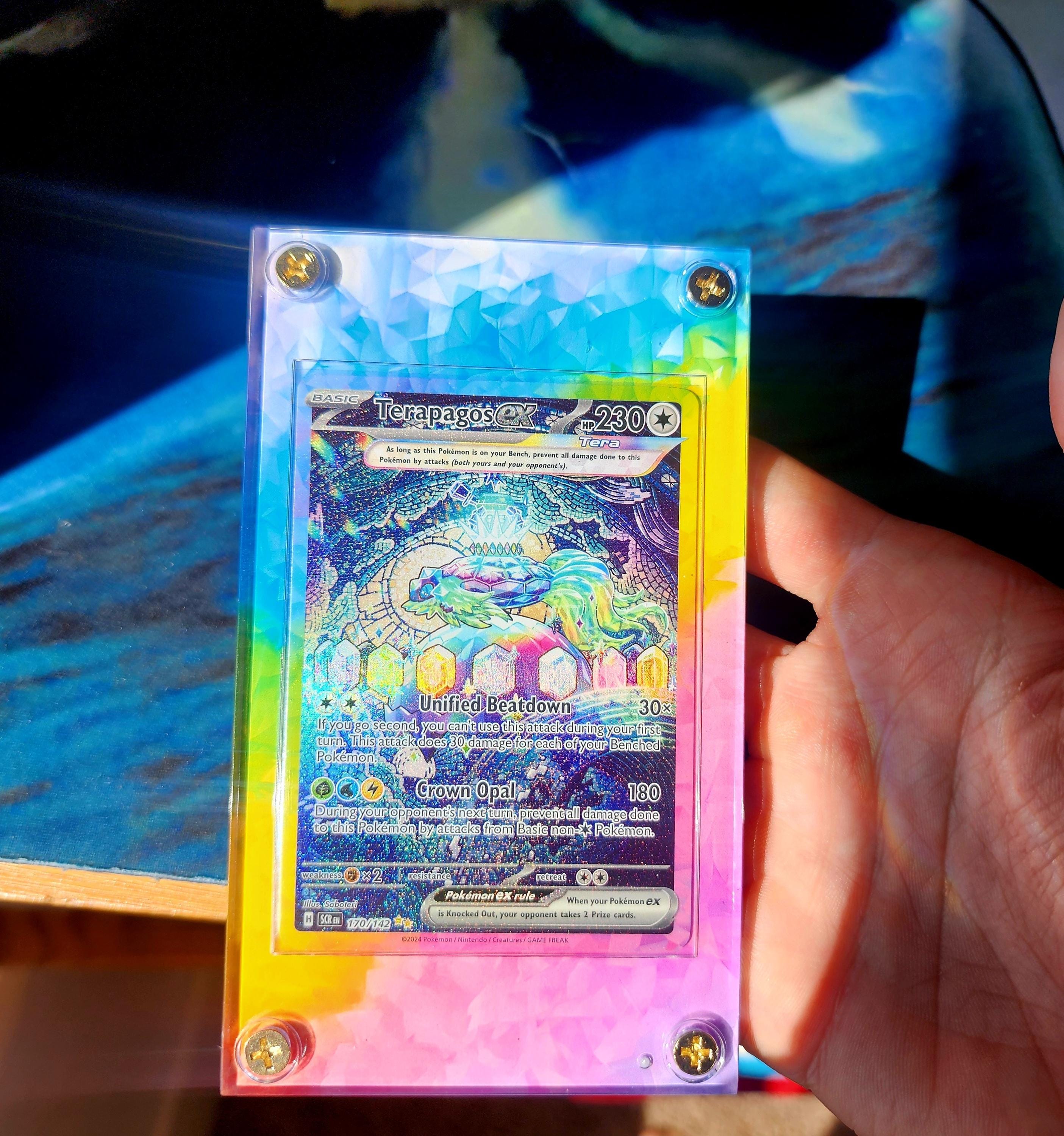 170 142 pokemon card Terapagos (Graded) Case This specific card features a stunning Terapagos ex 170/142 - PSA