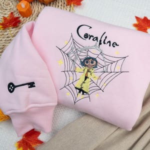 Horror Doll Movie Embroidered Shirt, Halloween Embroidered Shirt, Scary Doll Embroidered Sweaters,  Halloween Gift, Personalized Sweatshirt