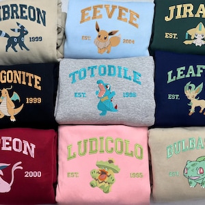 Anime Embroidered Shirt, Custom Anime Poke Character Embroidered Sweatshirt, Custom Ball on Sleeve Shirt, Gift for Him, Gift for Anime Lover