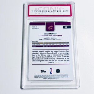 May include: A sports trading card encased in a clear plastic holder. The card features Evan Mobley of the Cleveland Cavaliers. The card has a purple and burgundy design with the Topps and NBA logos. The card is graded by Iconic Grading Co.