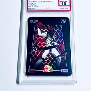 May include: A graded trading card featuring a stylized illustration of a boxer in white and black attire with red gloves and headgear. The card is labeled "2025 Battle Arena Griffey Castler Battle Foil #BF-360" and graded "Pristine 10".