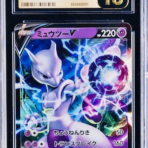 May include: A graded Mewtwo V Pok&eacute;mon card from the VSTAR Universe set, featuring a holographic design. The card is encased in a protective case and graded Pristine 10 by CGC. The card's text is in Japanese.