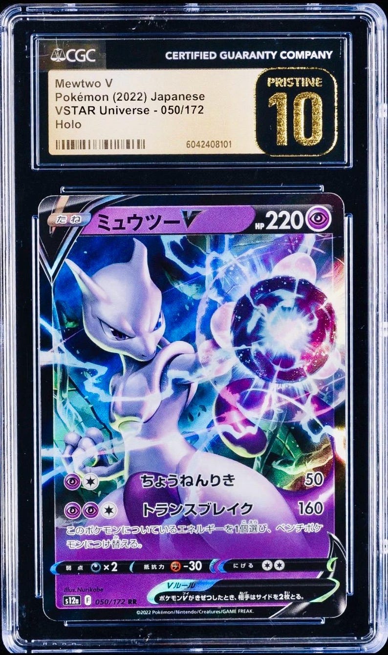 May include: A graded Mewtwo V Pok&eacute;mon card from the VSTAR Universe set, featuring a holographic design. The card is encased in a protective case and graded Pristine 10 by CGC. The card's text is in Japanese.