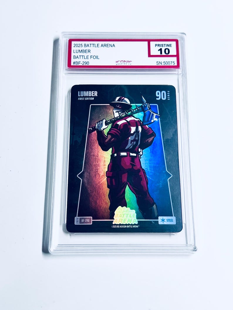 May include: A graded trading card featuring a character named "Lumber" from the "2025 Battle Arena" series. The card shows a figure in maroon and white attire holding a pickaxe. The card is graded "Pristine 10".
