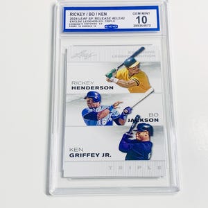 May include: A baseball card featuring Rickey Henderson, Bo Jackson, and Ken Griffey Jr. The card is graded GEM MINT 10 and encased in a protective holder. The card is from the 2024 Leaf SP. Release #ELE42 Exclusive Legends Edition Triple.