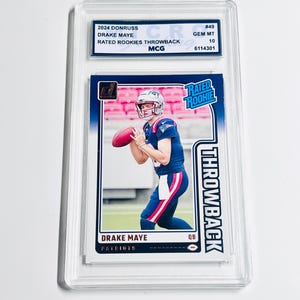 May include: A Drake Maye football trading card from the 2024 Donruss set, graded GEM MT 10. The card features a player in a Patriots uniform, labeled "Rated Rookie" and "Throwback."