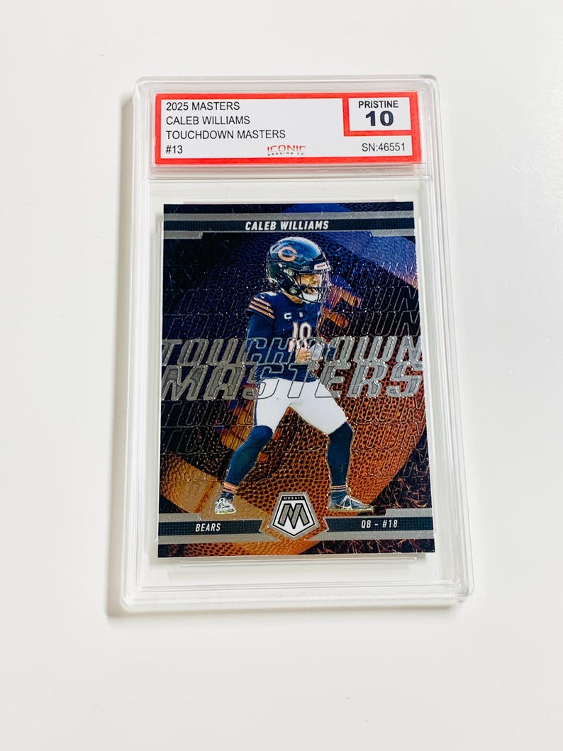 May include: A graded Caleb Williams football card from the 2025 Masters series. The card features a player in a Chicago Bears uniform with the text "TOUCHDOWN MASTERS". The card is graded Pristine 10 and encased in a clear protective holder.