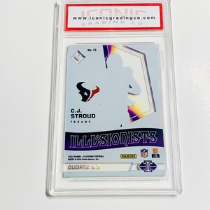 May include: A graded C.J. Stroud football card from the 2023 Panini Illusions series, encased in a protective holder. The card features the Texans logo and the text "ILLUSIONISTS". The grading company's website is visible at the top.