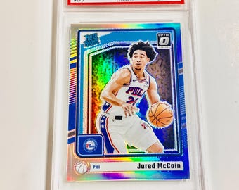 GRADED 10 JARED McCAIN Rookie Card 2024 Donruss Optic Holo Rated Rookie #270 Philadelphia 76ers PRISTINE Card