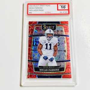 May include: A football trading card featuring Micah Parsons in a Penn State uniform. The card is a Red Lazer Prizm from the 2022 Select Draft Picks series, graded Pristine 10. The card is encased in a clear protective holder.