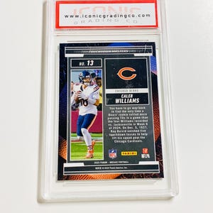 May include: A graded Caleb Williams football card from the 2025 Panini Mosaic Football series. The card features a photo of Williams in his Chicago Bears uniform. The card is encased in a clear protective holder.