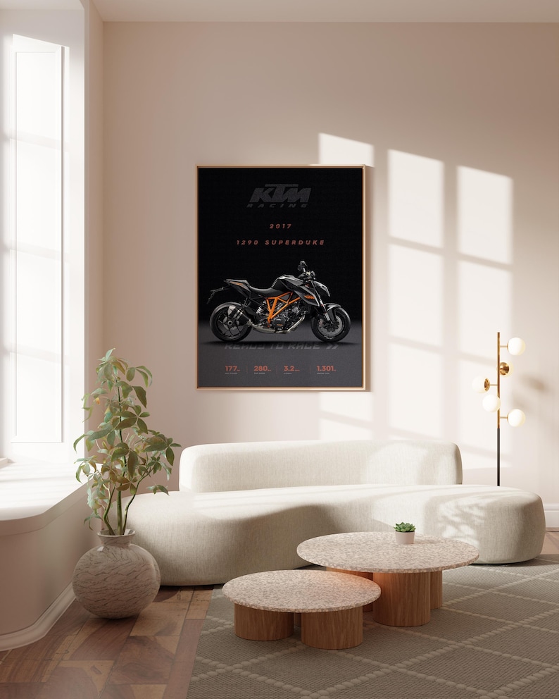 May include: A black and orange KTM 1290 Superduke motorcycle poster with the text "KTM Racing 2017" on a black background.