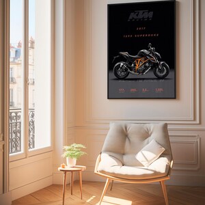 May include: A black and orange KTM 1290 Superduke motorcycle poster with the text "KTM Racing 2017 1290 Superduke" and "Ready to Ride 177 260 32 1301".