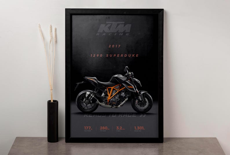 May include: A black and orange KTM 1290 Superduke R motorcycle poster with the text "KTM RACING 2017 1290 SUPERDUKE READY TO RACE 177. 280. 3.2. 1,301."
