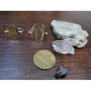 brass and silver moon rings