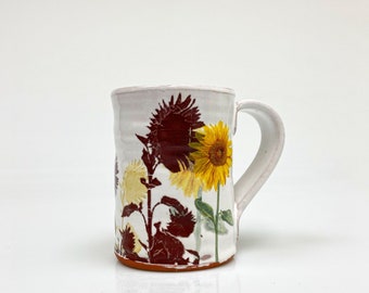 Sunflower mug with glossy glaze and flowers