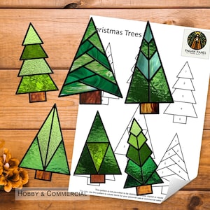 May include: A printable pattern for stained glass Christmas trees. The pattern includes five different tree designs, each with a unique geometric pattern. The pattern is labeled "Hobby & Commercial" and includes instructions for use.