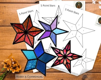 May include: Four stained glass star patterns with numbered sections. The patterns are printed on white paper with the text "5 Point Stars" and "Hobby & Commercial".
