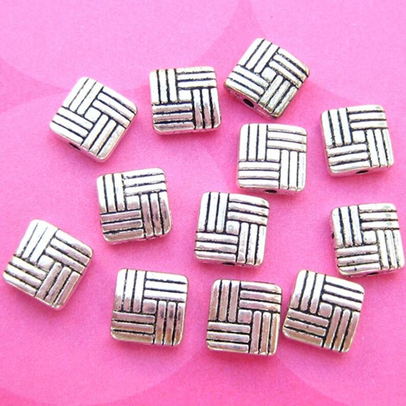 8 millimeter puff square beads with a basketweave design view 2