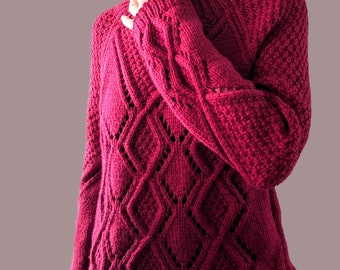 Hand knitted pullover with reglan sleeve and intricate diamond cables design.  Bulky, lightweight and warm. Women&#39;s cropped length sweater.