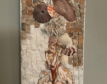 Seashell wall art made with seashells and hand cut stone