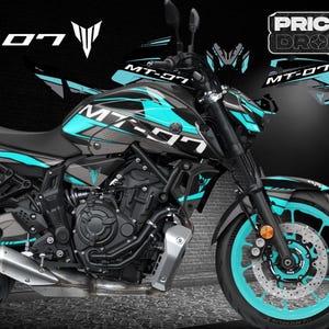 May include: A black Yamaha MT-07 motorcycle with blue and gray accents. The motorcycle has a black seat and a blue and gray stripe design on the tank and side panels. The motorcycle has a blue rim on the front wheel and a blue rim on the rear wheel.