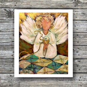 May include: A painting of an angel with wings, holding a spool of thread and a needle. The angel is sitting on a colorful patchwork quilt.