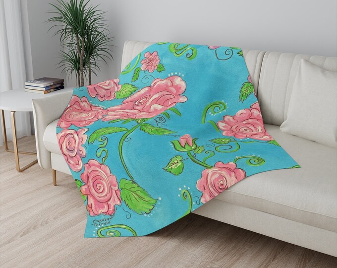 Pretty Pink Roses and Turquoise Background printed on a soft Sherpa Blanket
