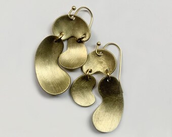 Brass dangle Lucie minimalist chandelier earrings, cool contemporary aesthetic design, based on abstract squiggly shapes | Slow handmade