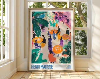 May include: A colourful painting by Henri Matisse depicting a group of people gathered around tables in a garden setting. The painting features vibrant colours, including green, blue, yellow, orange, and pink. The text "FRANCE COLLAGE EXHIBITION" is visible at the bottom right corner of the painting.
