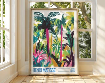 May include: A framed poster with a colorful abstract painting of palm trees in shades of green, pink, yellow, and blue. The poster is titled "HENRI MATISSE" and has the text "FRANCE COLLAGE EXHIBITION" in the bottom right corner.