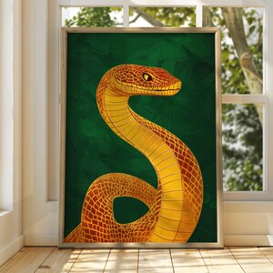 May include: A framed illustration of a golden snake with orange scales on a dark green background.