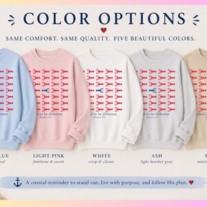 May include: Five crewneck sweatshirts in light blue, light pink, white, ash, and sand. Each features a grid of red lobster graphics with one blue lobster in the center, the text "called to be different," and the scripture reference "Romans 12:2."