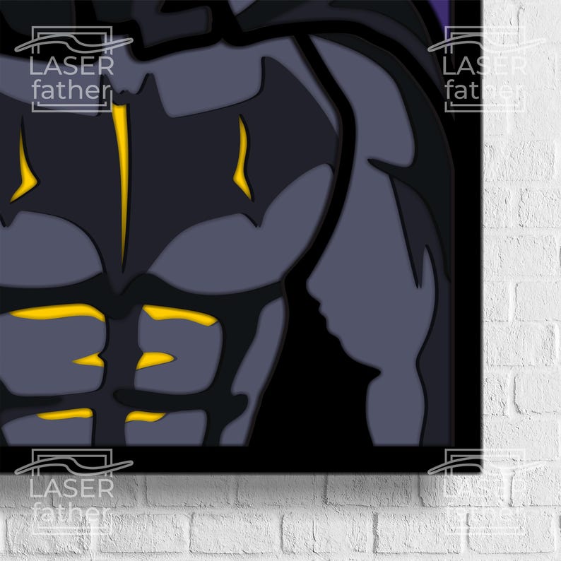Pu&ograve; includere: Primo piano di un costume da supereroe nero e giallo. Il costume ha un torso muscoloso e un mantello. Il viso del supereroe non &egrave; visibile.