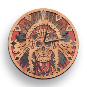 May include: A wooden wall clock with a red background and a cutout design of a Native American headdress with a skull face. The clock hands are black and red.